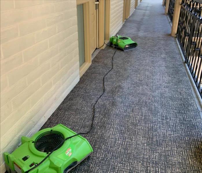 Drying equipment in hallway.