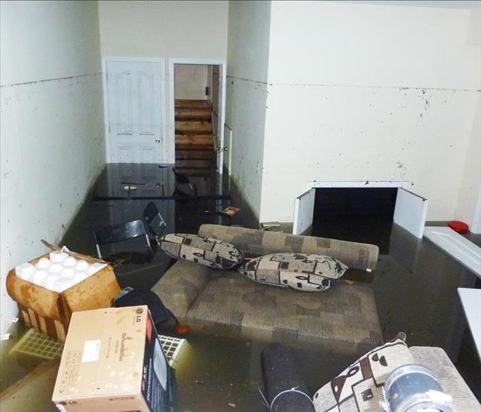 Completely flooded basement. A visible line is showing maximum water level higher than 7 feet.